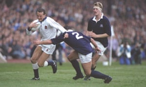 John Webb tries to hold off the tackle of Scotland’s John Allen during the World Cup semi-final at Murrayfield in Edinburgh.