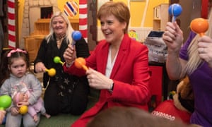 Nicola Sturgeon plays with local children during a visit to the Jelly Tots & Cookies Play Cafe in Uddingston, South Lanarkshire