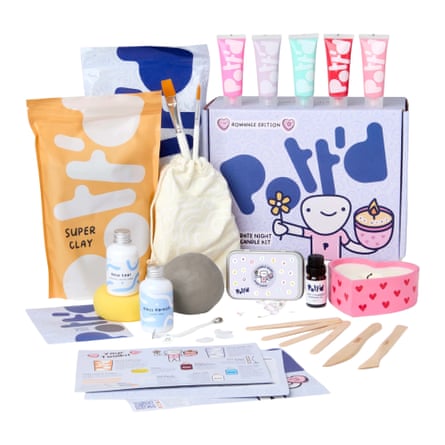Pott’d Date Night Candle Kit is displayed with its packaging. The items are bright pastel colours and include clay shaping tools, a heat shape candle and instruction sheets.