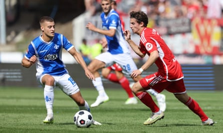 Fabian Nuernberger (left) vies for the ball with Brenden Aaronson