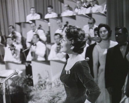 Lys Assia win the Eurovision Song Contest for Switzerland in 1956.