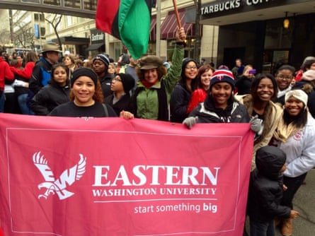 Dolezal with students leading a parade for Martin Luther King Jr Day, 2014.