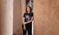 Lynnette Rizek standing in a space with what appear to be unpainted plastered walls