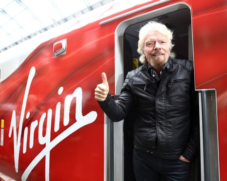 Richard Branson on board a Virgin train