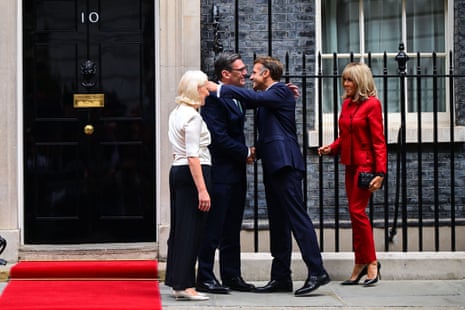 Andy Burnham and his wife Marie-France van Heel greeting the president and his wife.
