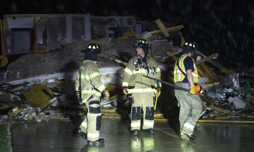 Firefighters search a home in Andover.