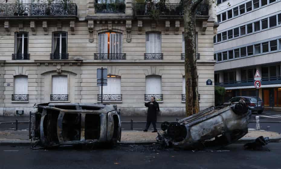 Charred cars after the protests in Paris on Sunday.