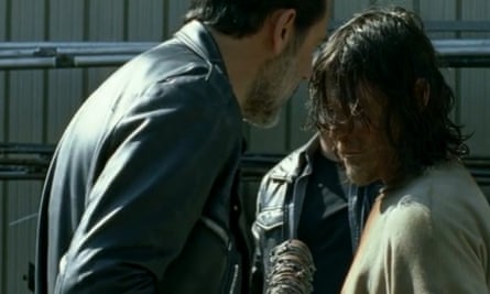 Negan waves his baseball bat Lucille close to Darryl’s head, but our hero doesn’t flinch.