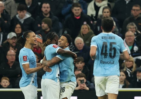 Manchester City’s Savinho celebrates scoring their first goal.