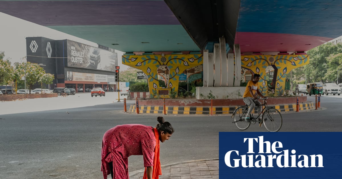Life under a Delhi flyover: how one homeless family endures the city’s extreme heat