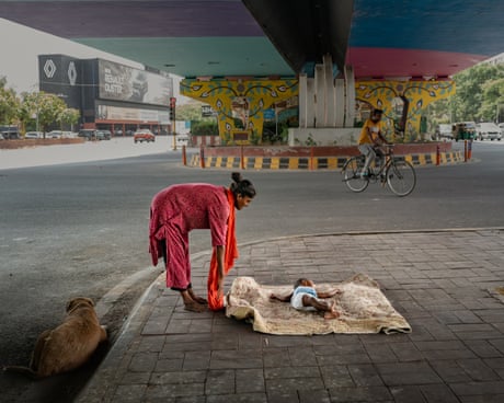 Life under a Delhi flyover: how one homeless family endures the city’s extreme heat