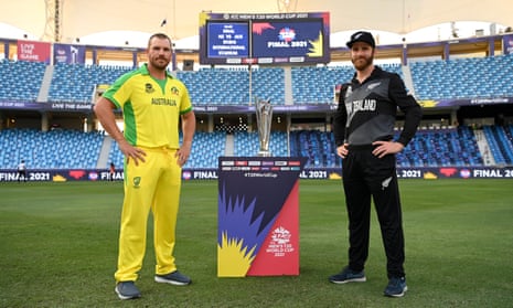 ICC Men's T20 World Cup Final 2021 - Previews<br>DUBAI, UNITED ARAB EMIRATES - NOVEMBER 13: Rival captains Aaron Finch of Australia and Kane Williamson of New Zealand pose with the T20 World Cup trophy prior to the ICC Men's T20 World Cup final match between New Zealand and Australia at Dubai International Stadium on November 13, 2021 in Dubai, United Arab Emirates. (Photo by Gareth Copley-ICC/ICC via Getty Images)