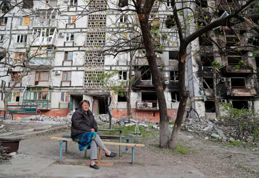 Russia-Ukraine war: Moscow plans to annex Donetsk and Luhansk, US says; Britain pledges another £300m in military aid – live | Ukraine 3 Local resident Tatiana Bushlanova, 64, sits on a bench near an apartment building heavily damaged in the southern port city of Mariupol.