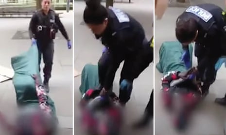 Police officer caught dragging homeless man across the ground in Manchester