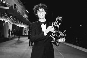 Filippo Scotti poses with the Marcello Mastroianni award for best new young actor, also for The Hand Of God