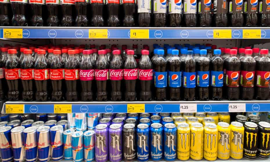 Fizzy drinks on a supermarket shelf.