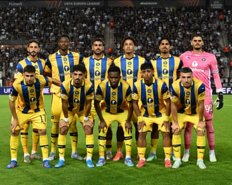 Maccabi Tel Aviv's players pose for a team photo prior to the start of the Europa League match with PAOK at Toumpa stadium, in Thessaloniki, Greece