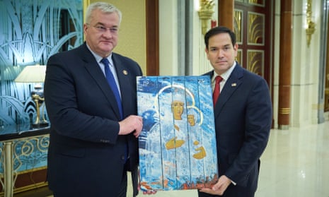 A handout photo made available by the Ukrainian Presidential Press Service shows Ukrainian Foreign Minister Andrii Sybiha (L) presenting US secretary of state Marco Rubio (R) with a religious icon painted on planks from an ammunition box during a meeting between US and Ukrainian officials in Jeddah, Saudi Arabia, 11 March 2025.
