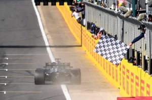 Lewis Hamilton crossed the finish line to win the Grand Prix.