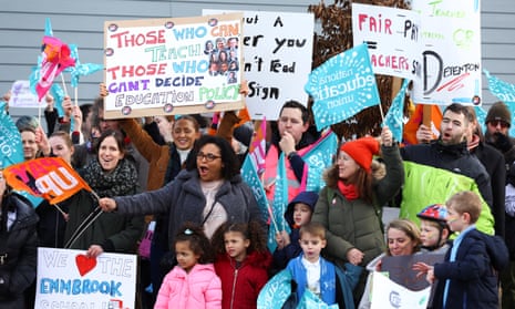 Teachers, parents and children join the strike action at a protest in Wokingham.