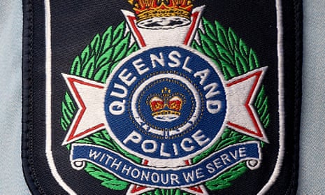 Stock photograph of a badge on the arm of a Queensland police officer