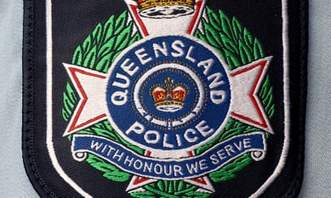 Stock photograph of a badge on the arm of a Queensland police officer