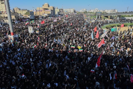 A massive crowd fill the streets in Najaf during a farewell ceremony for Khamenei.