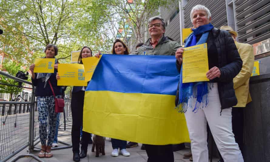 A group of would-be refugee hosts, sponsors and supporters gather outside the Home Office calling on the UK government to speed up the visa process for Ukrainian refugees
