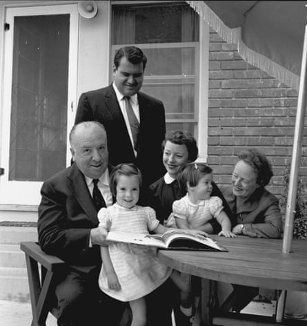 The Hitchcock family sitting at a table