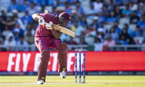 Oshane Thomas of West Indies gloves the ball to Rohit Sharma of India to lose his wicket off the bowling of India’s Mohammed Shami.