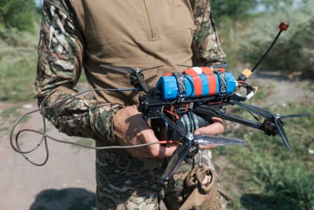 A serviceman with an FPV drone.