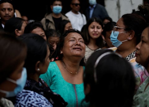 Bina Awale mourns at her brother's funeral