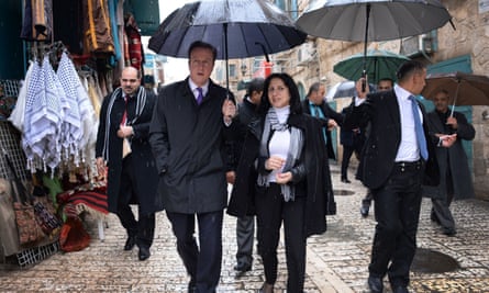 Vera Baboun shows former UK Prime Minister David Cameron around Bethlehem in 2014.