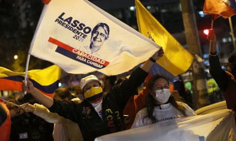 Supporters of ecuador presidential candidate Guillermo Lasso wave flags