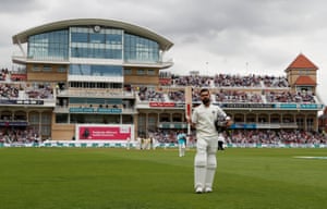 Kohli is applauded as he leaves the field after being bowled lbw by Woakes for 103.