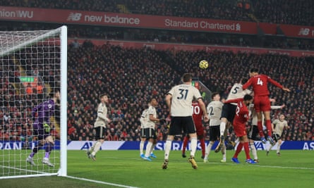 Virgil van Dijk heads home Liverpool’s first goal from a corner.