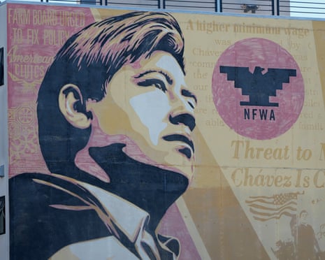 A mural of a man with an eagle symbol above the letters 'NFWA'