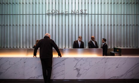 The Condé Nast logo is seen at the front desk at One World Trade Center in New York City. The unions held a rally outside on Saturday.