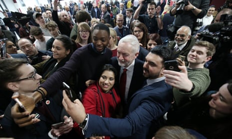 Labour leader Jeremy Corbyn poses for selfies with supporters after he delivered a Brexit speech