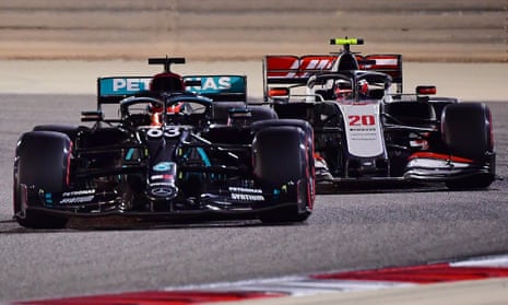 Mercedes’ George Russell, No 63, battles with the Haas of Kevin Magnussen during the Sakhir Grand Prix.
