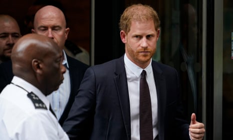Prince Harry leaves the High Court after giving evidence in his phone-hacking case in London on Tuesday.
