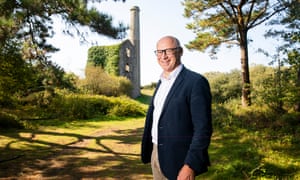 Jeremy Wrathall standing next to historical Cornish mine