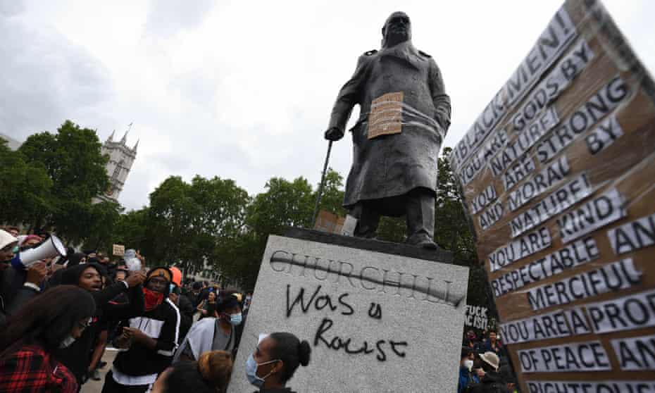 Protesters gather in Parliament Square Garden, London, on Sunday.
