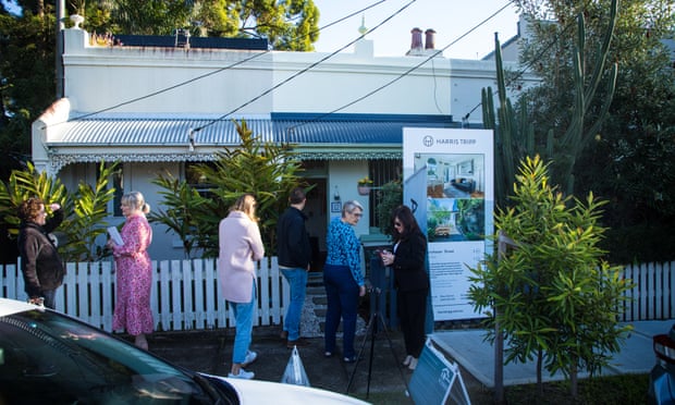 Prospective buyers line up at 12 Manchester St, Dulwich Hill. Price guide $1.2m, sold for $1.36m. 