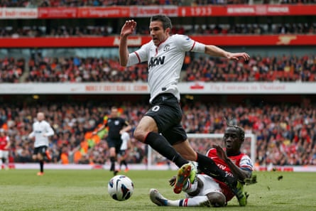 Robin van Persie is fouled by Bacary Sagna
