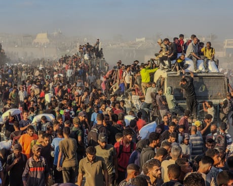 Palestinians in northern Gaza flock to an aid center set up by Gaza Humanitarian Foundation, on 17 June.