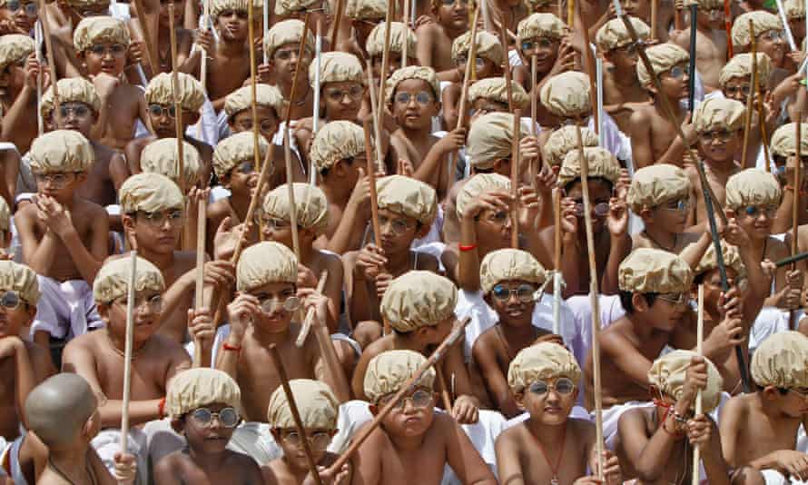 Schoolchildren dress as Gandhi during celebrations to mark the 143rd anniversary of his birth.