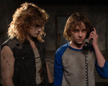 Brady Hepner and Mason Thames in The Black Phone.