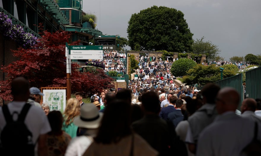 Tom Jenkins’ best shots of Wimbledon 2022 – in pictures | Wimbledon 2022 19 Large crowds move around the grounds on day five.