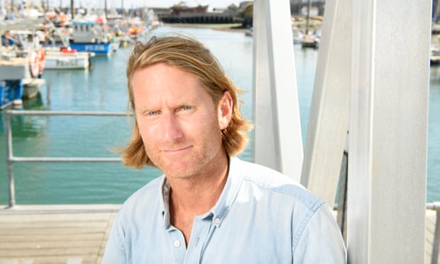 Chris Rumford with the harbor in the background